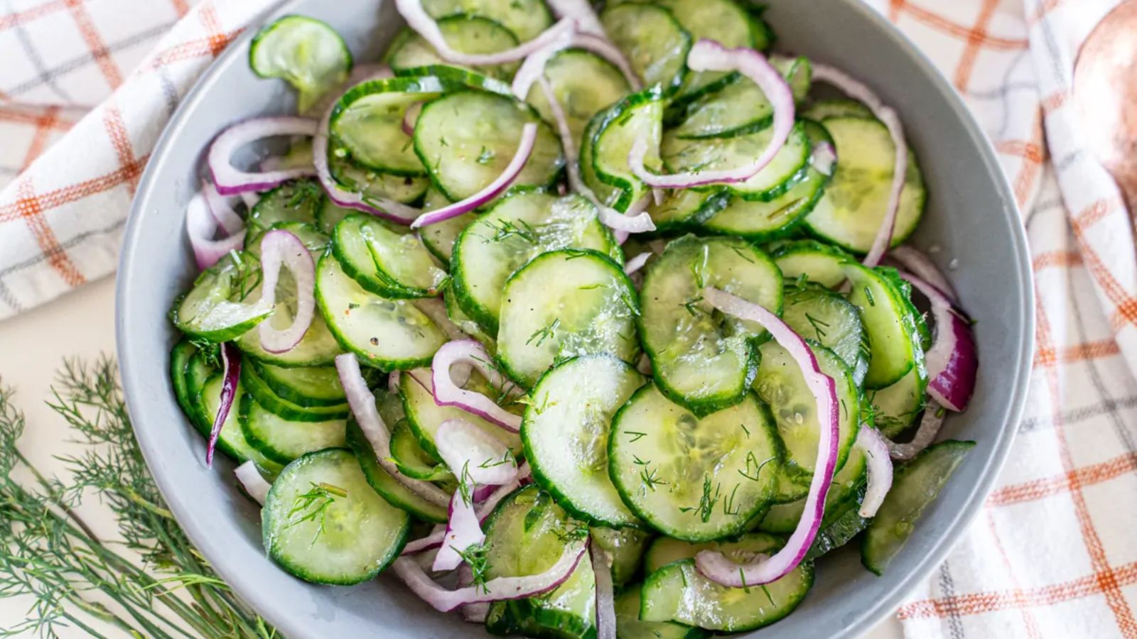 Cucumber salad in a bowl.