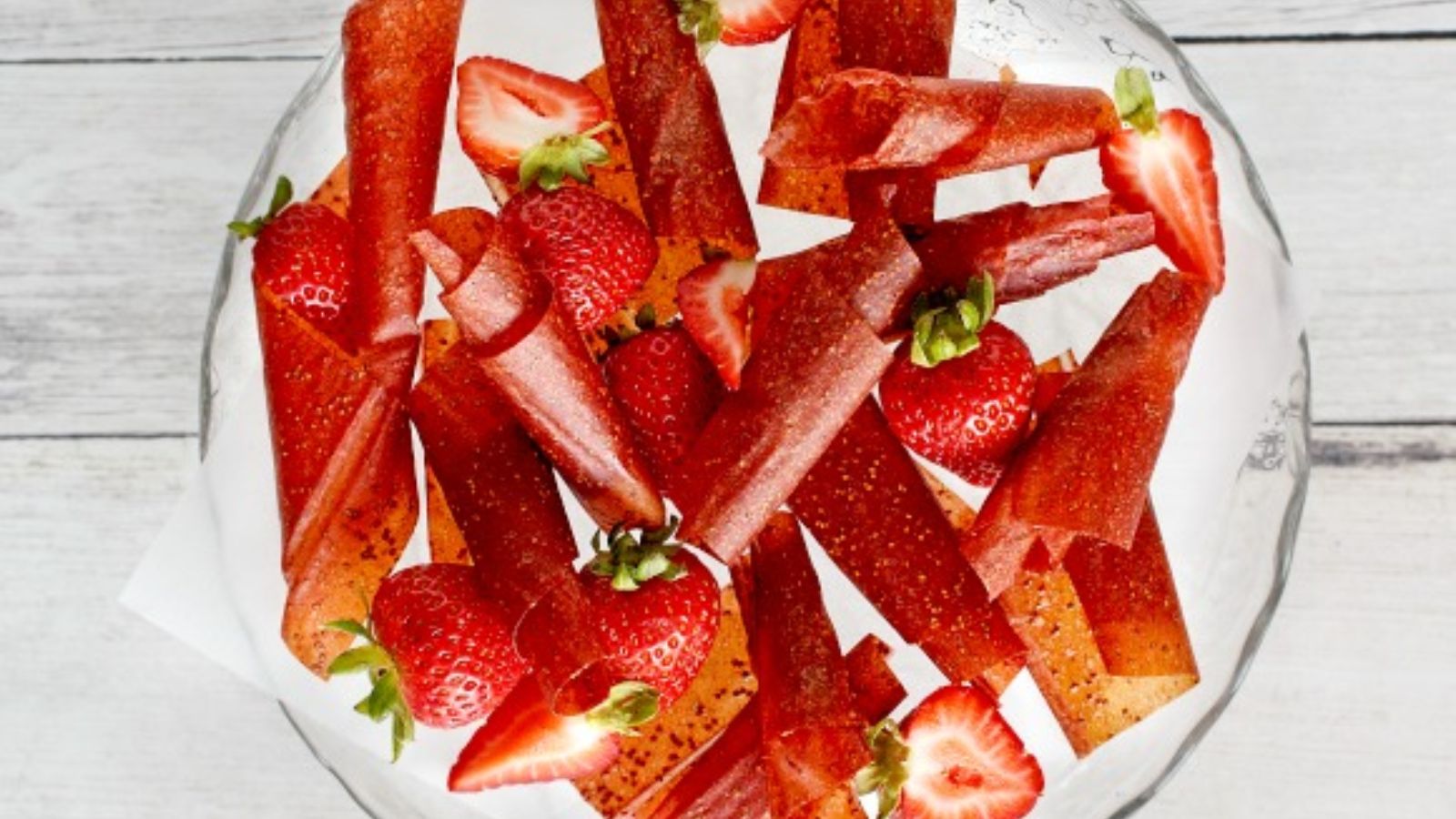 Strawberry roll ups in a bowl.