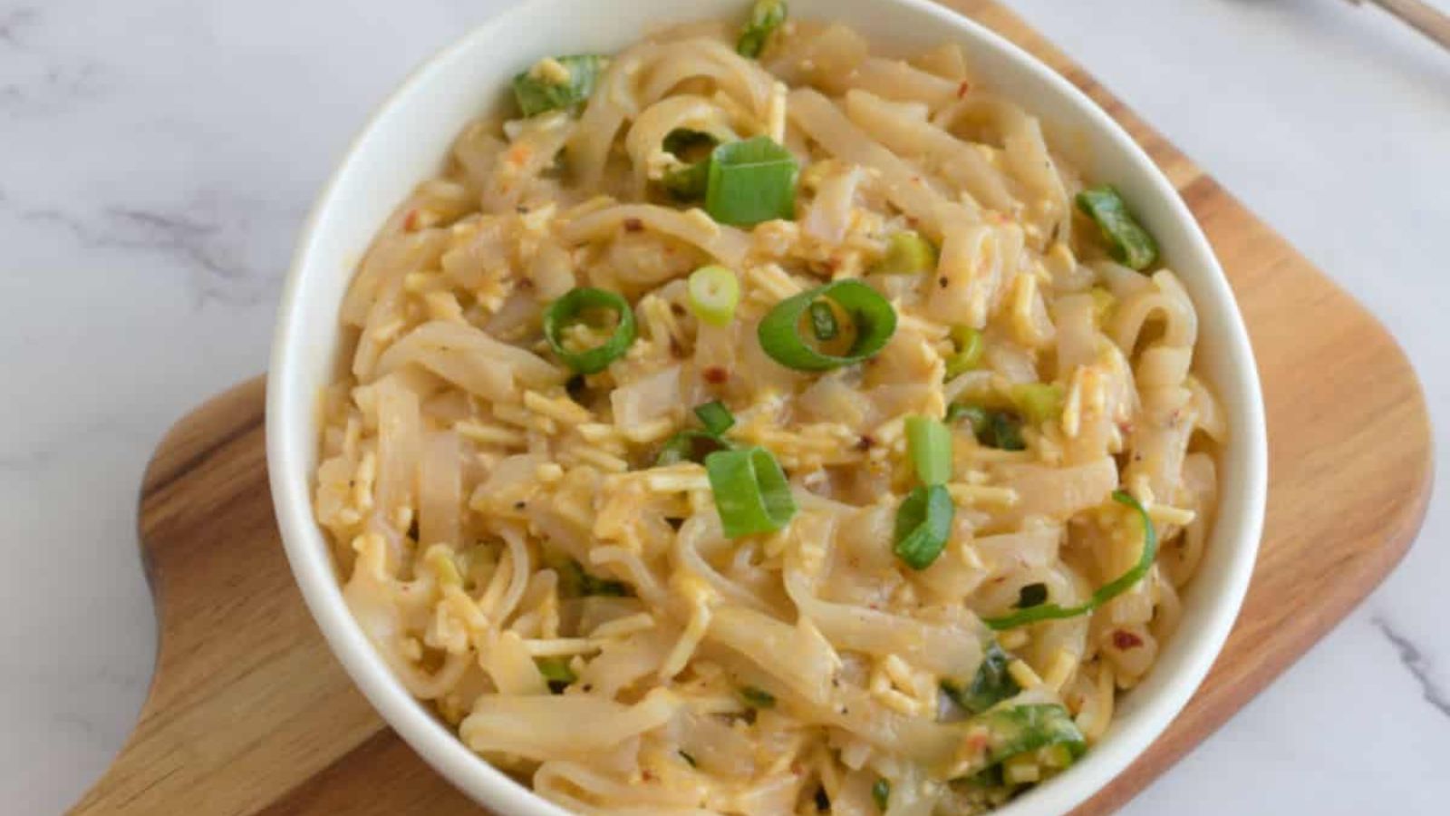 Garlic noodles in a bowl.