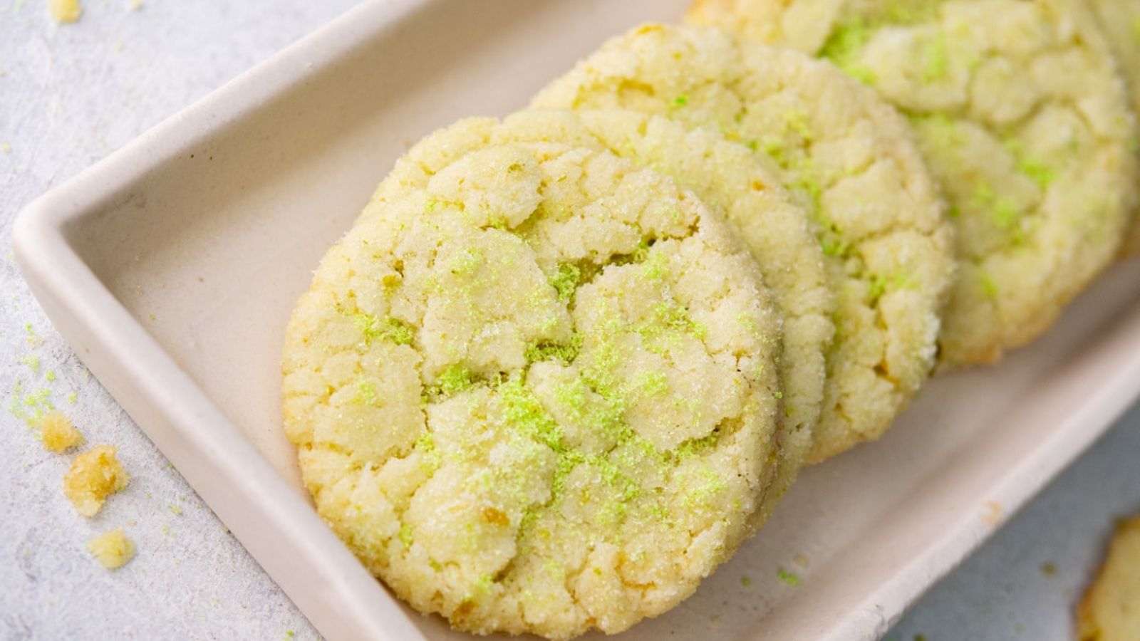 Key lime cookies on a plate.