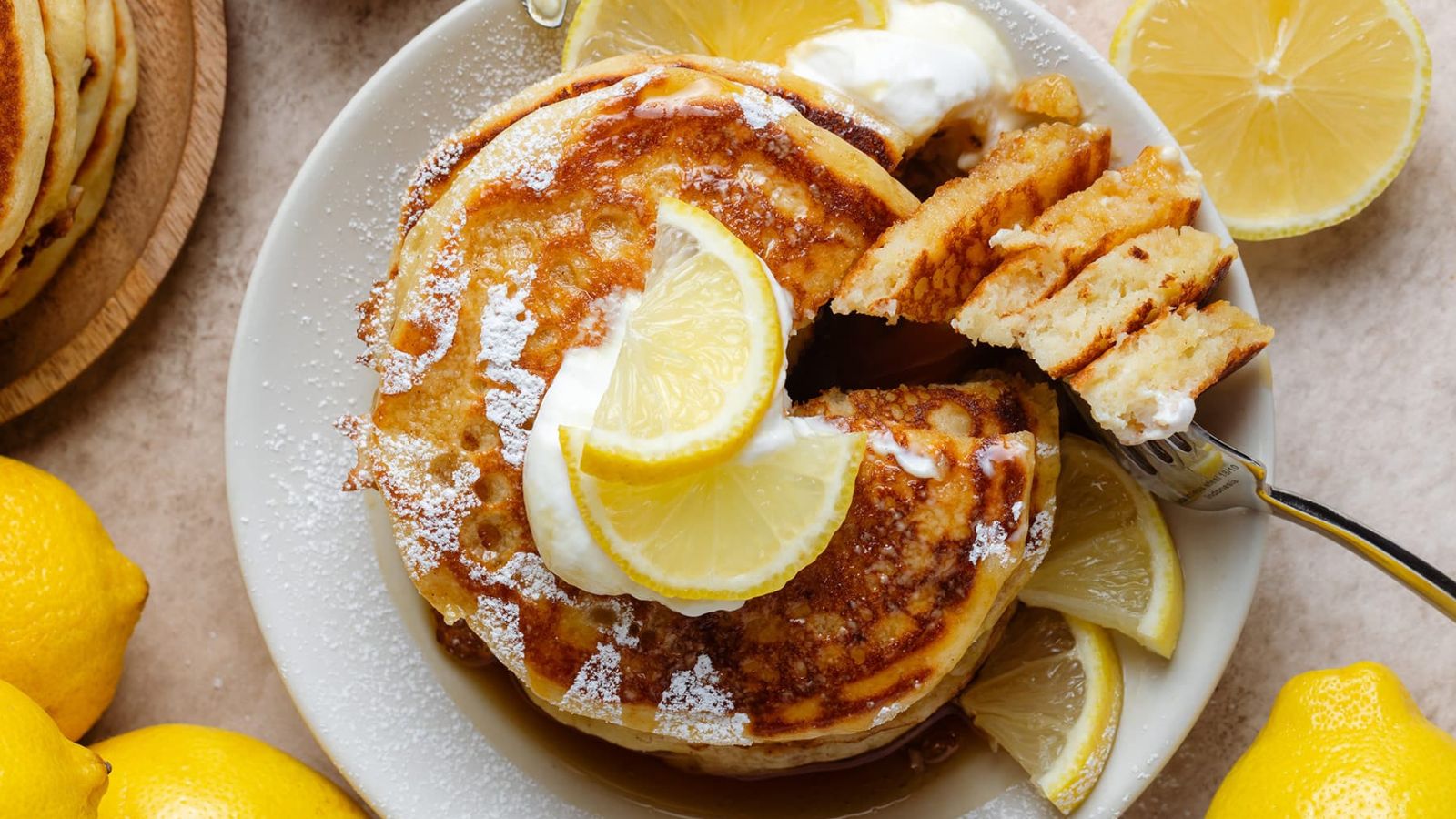 Lemon pancakes on a plate.