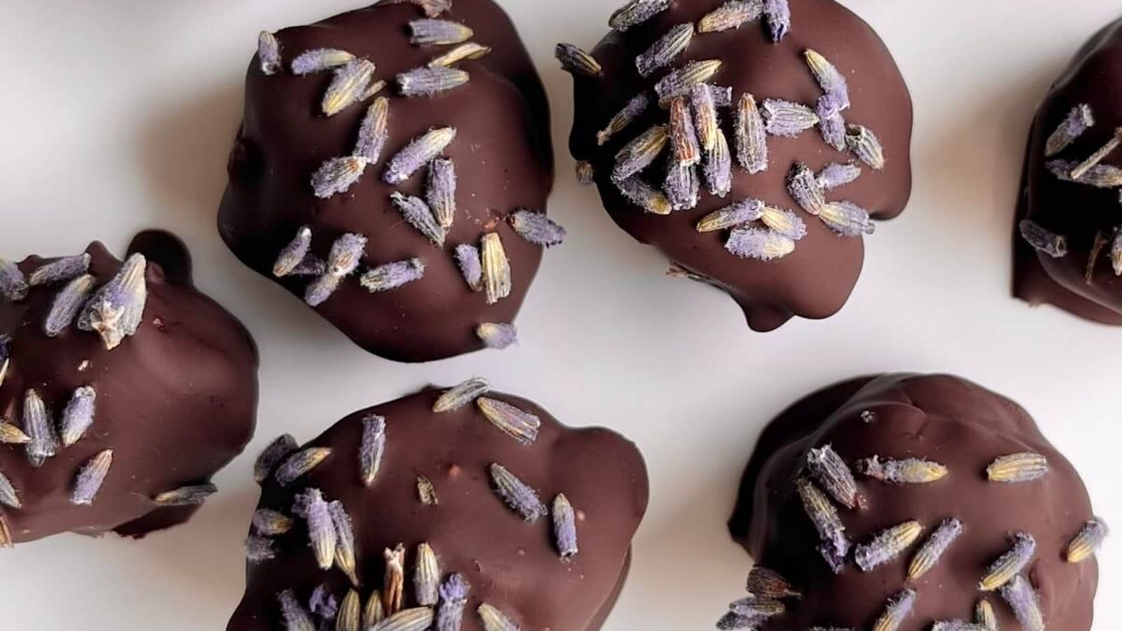 Lavender truffles on a white background.