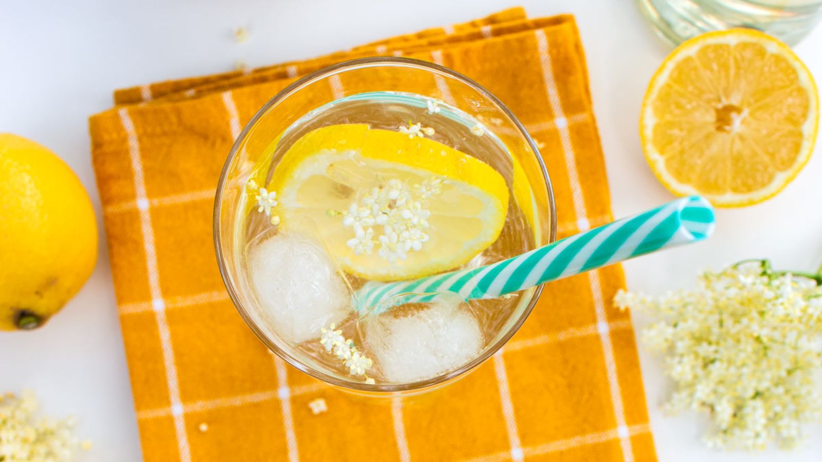 Elderflower syrup in a glass.