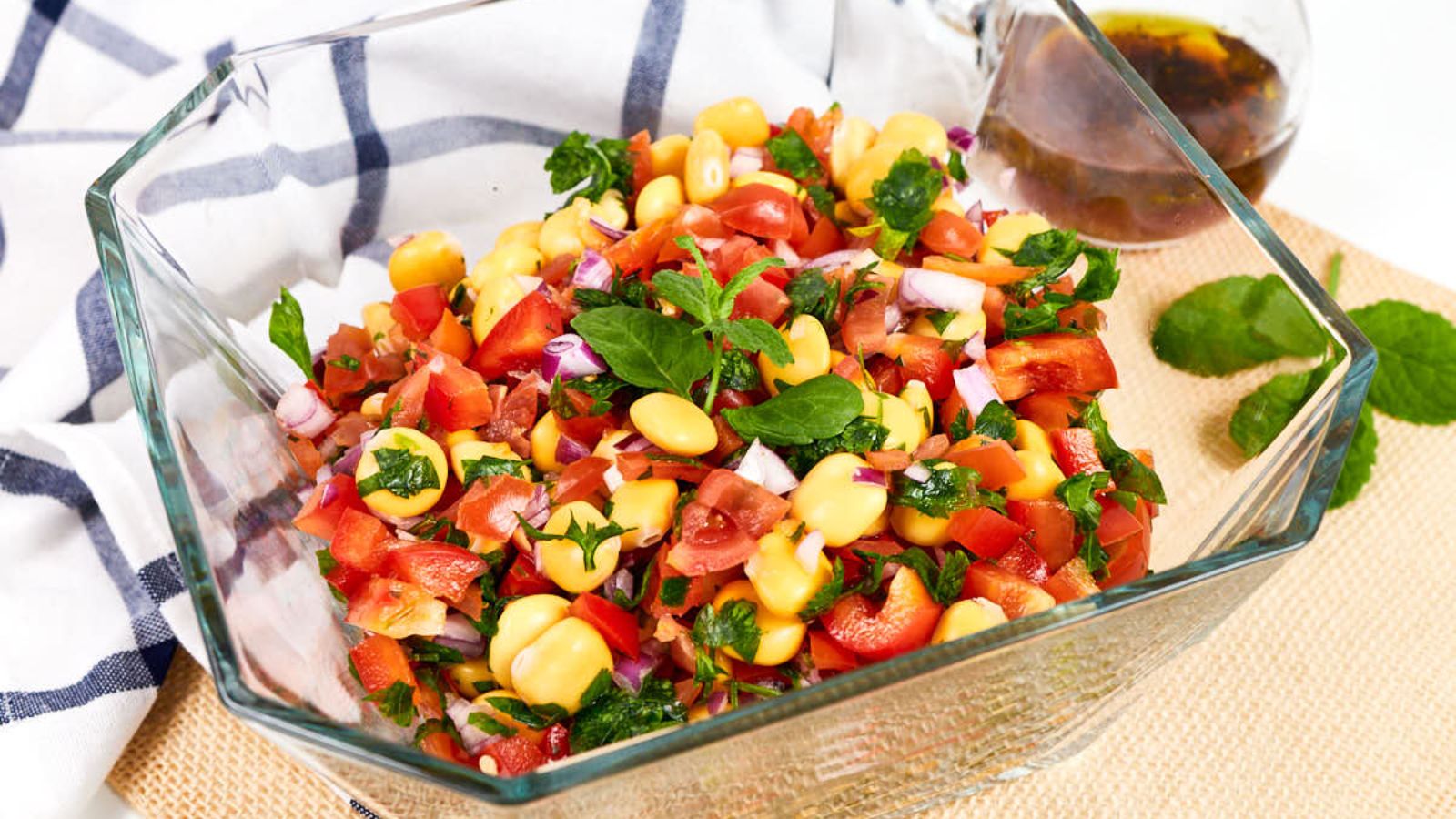 Bean salad in a glass bowl.
