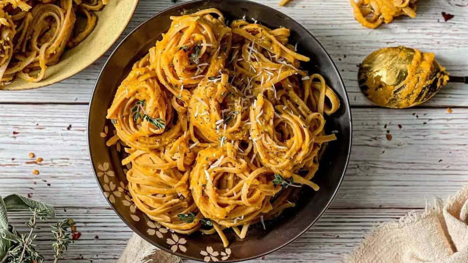 Pasta with roasted garlic butternut on a plate.