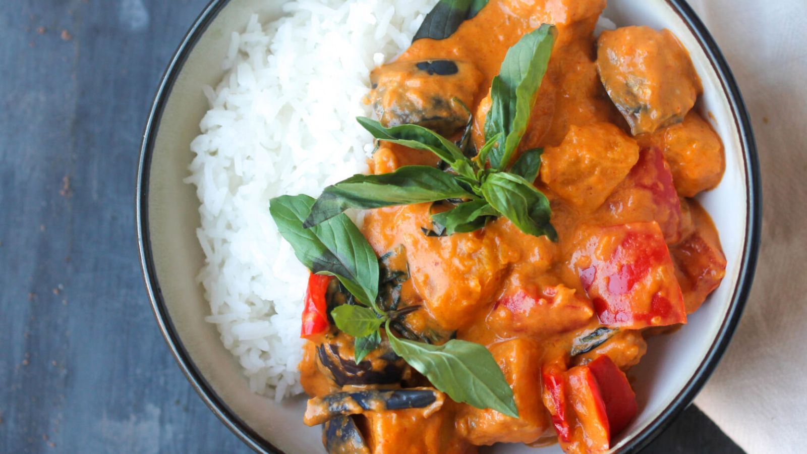 Red thai curry in a bowl.