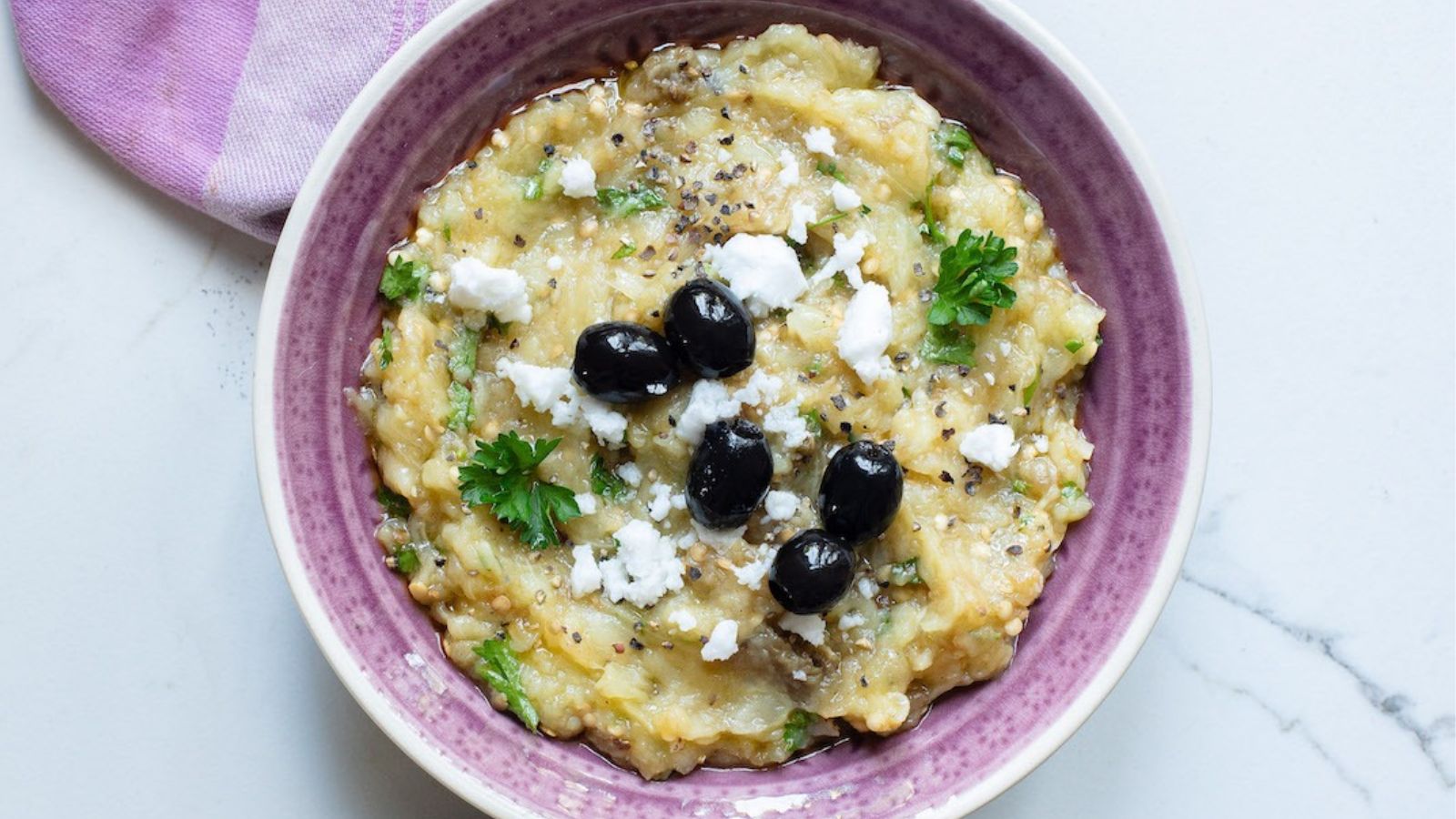 Greek eggplant dip in a bowl.