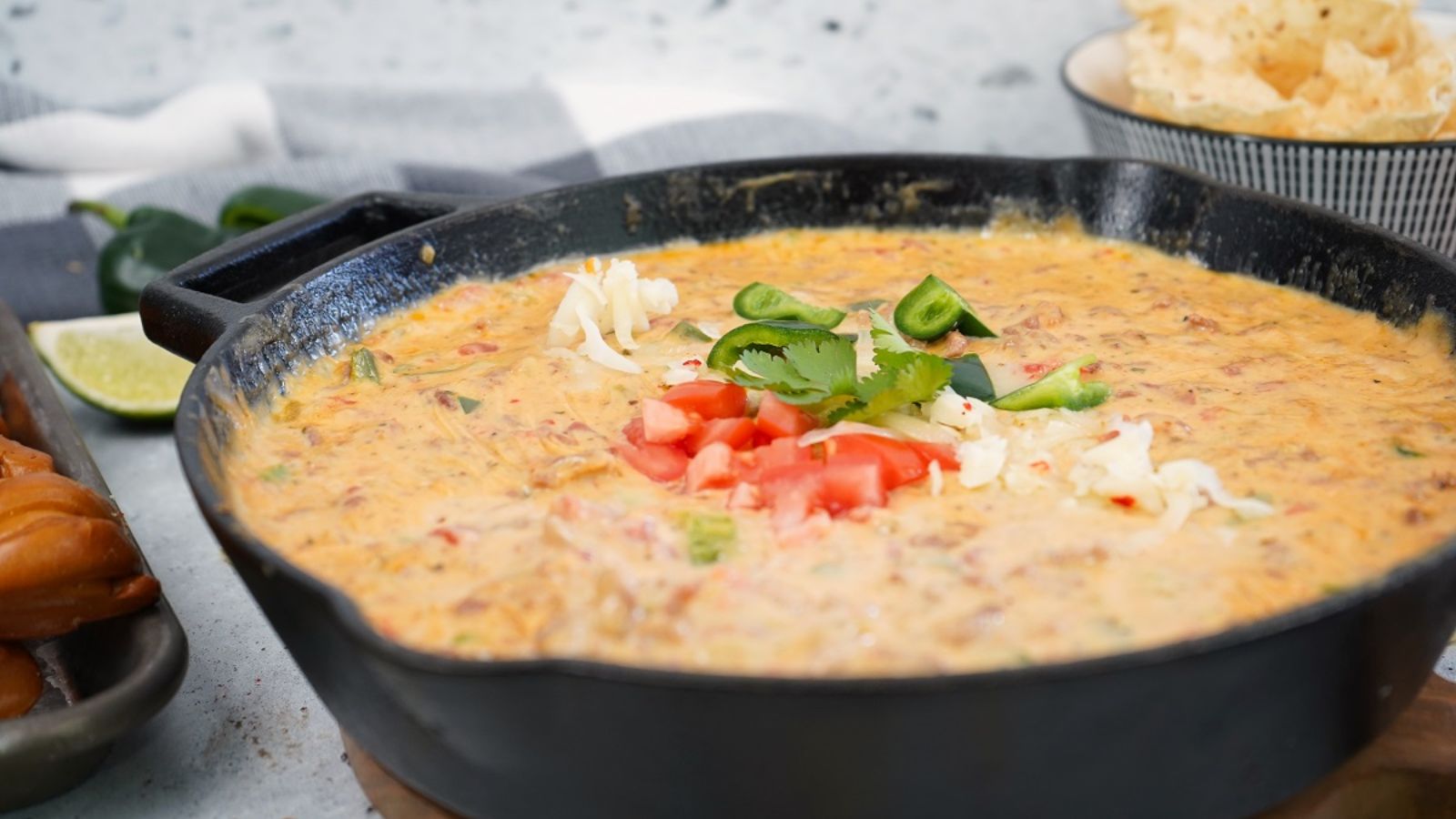 Queso with poblano and pepper jack in a pot.