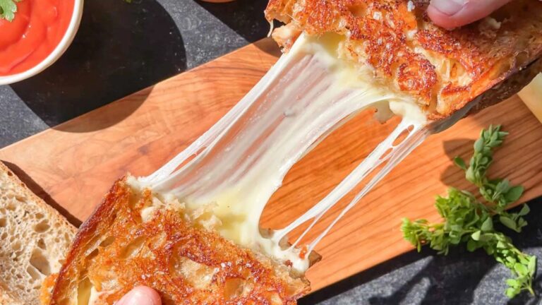Grilled cheese with oozing cheese.