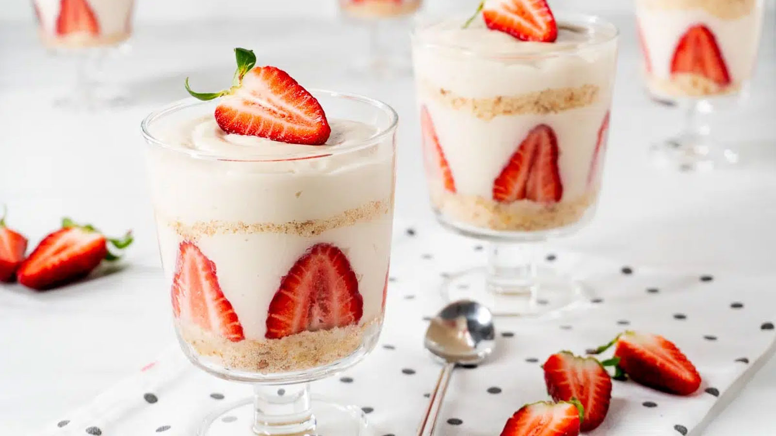 Glass sherbet bowls with strawberry magnolias.