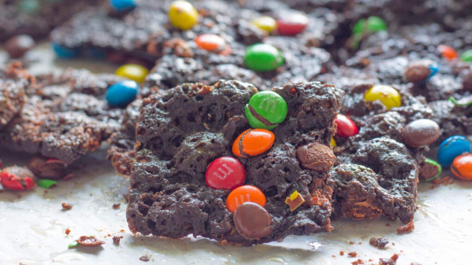 Brownie brittle covered with M&Ms candies.