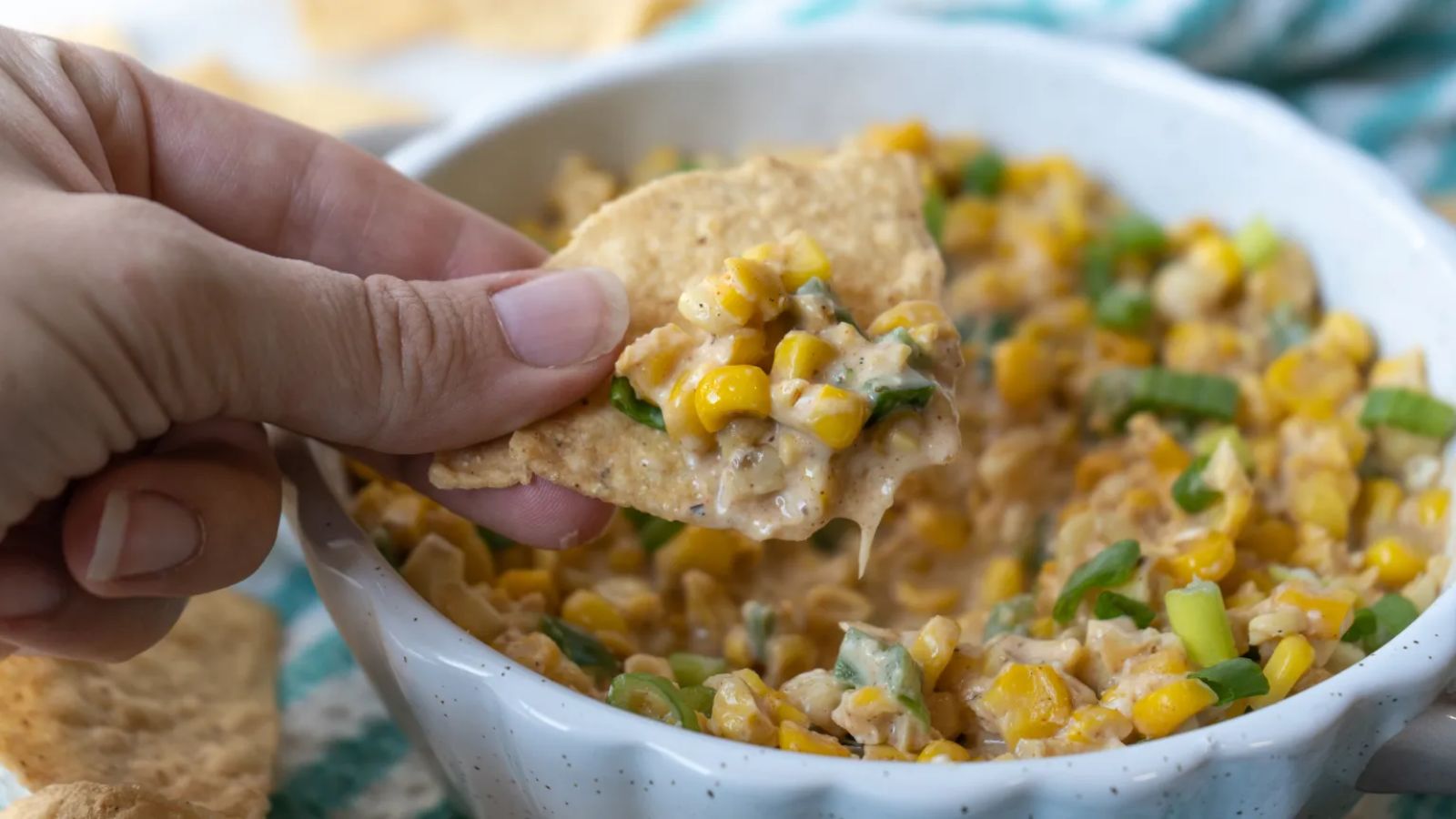Chip dipped in cajun corn.