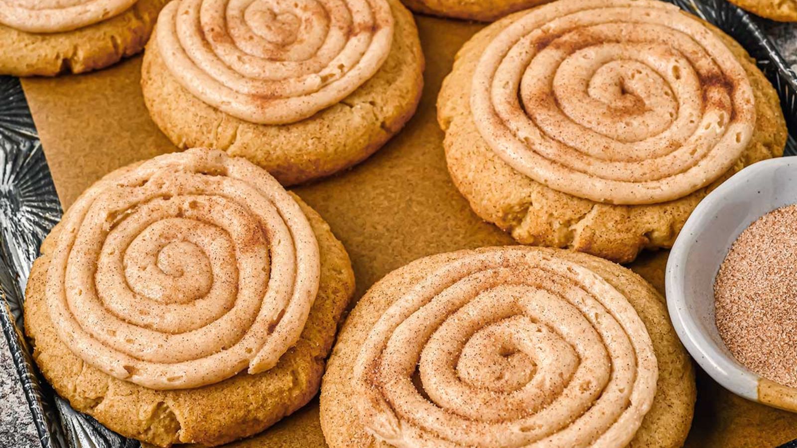 Churro cookies on a wooden board.