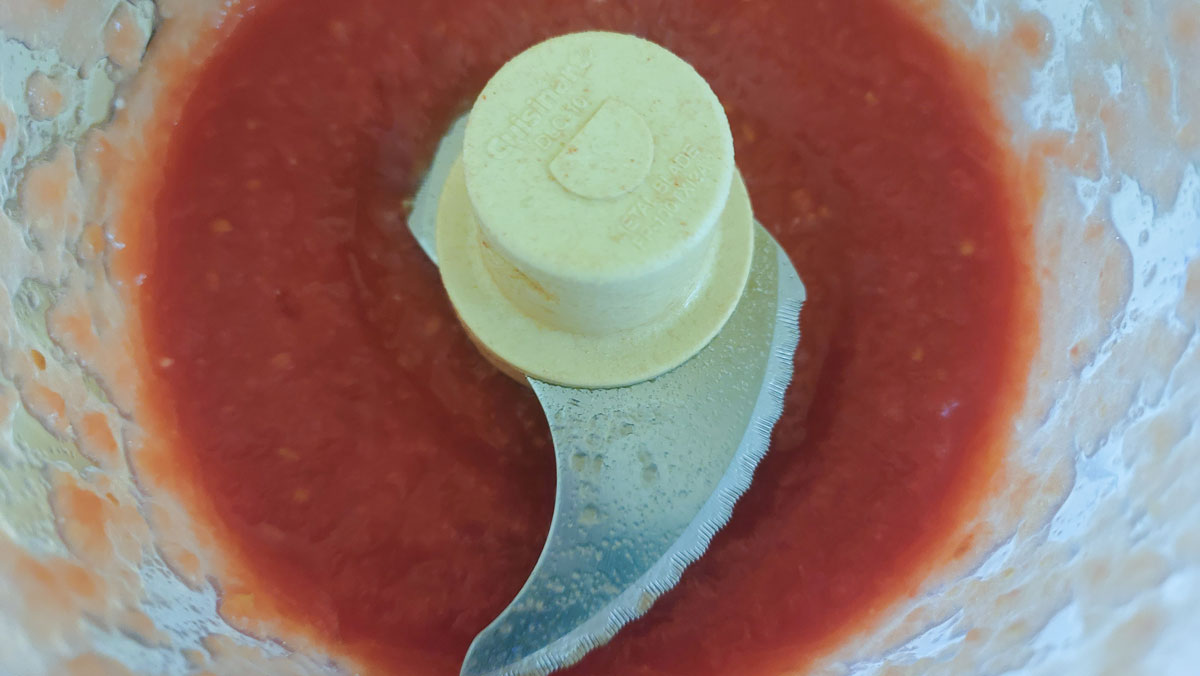 Tomatoes puréed in the food processor.