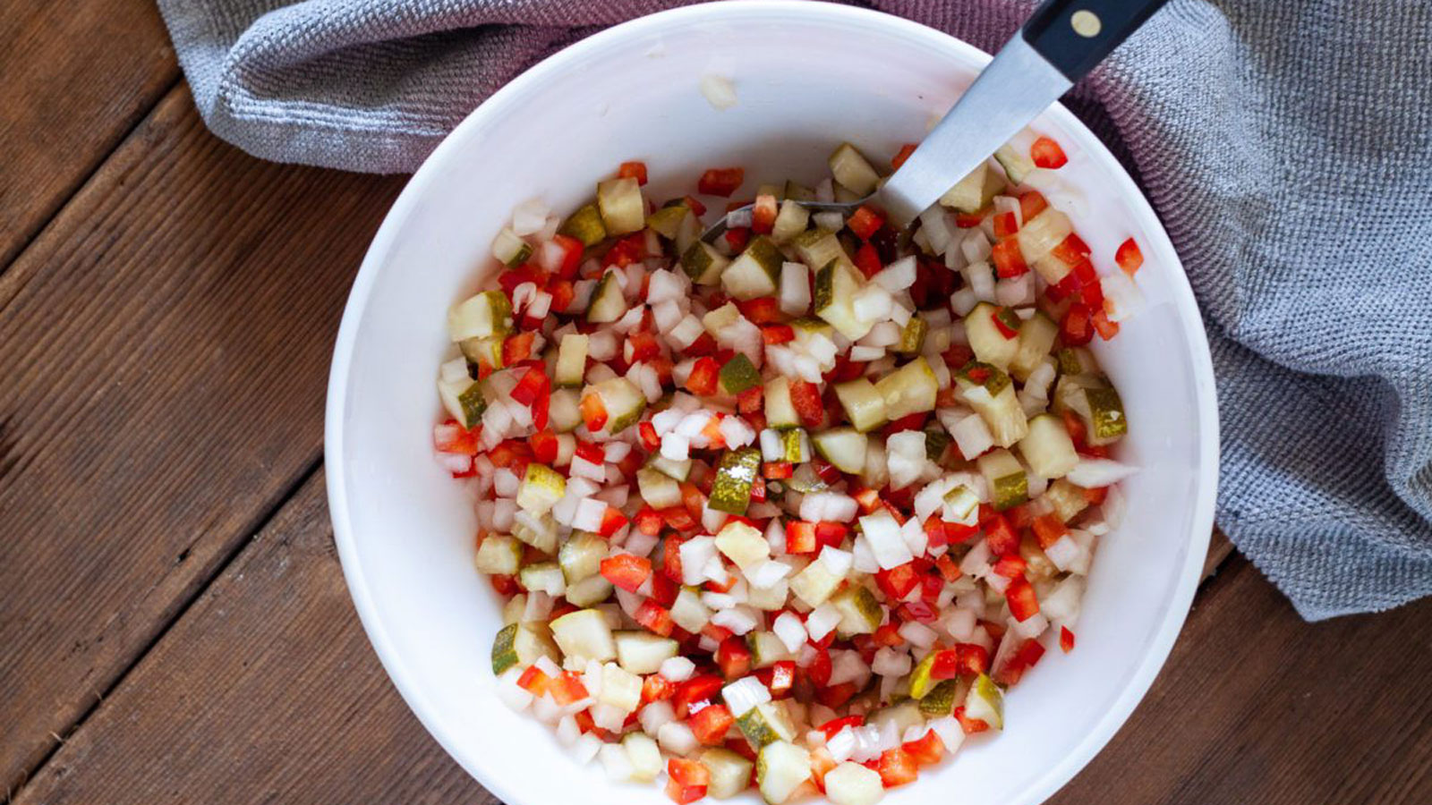 White bowl filled with fresh salsa.