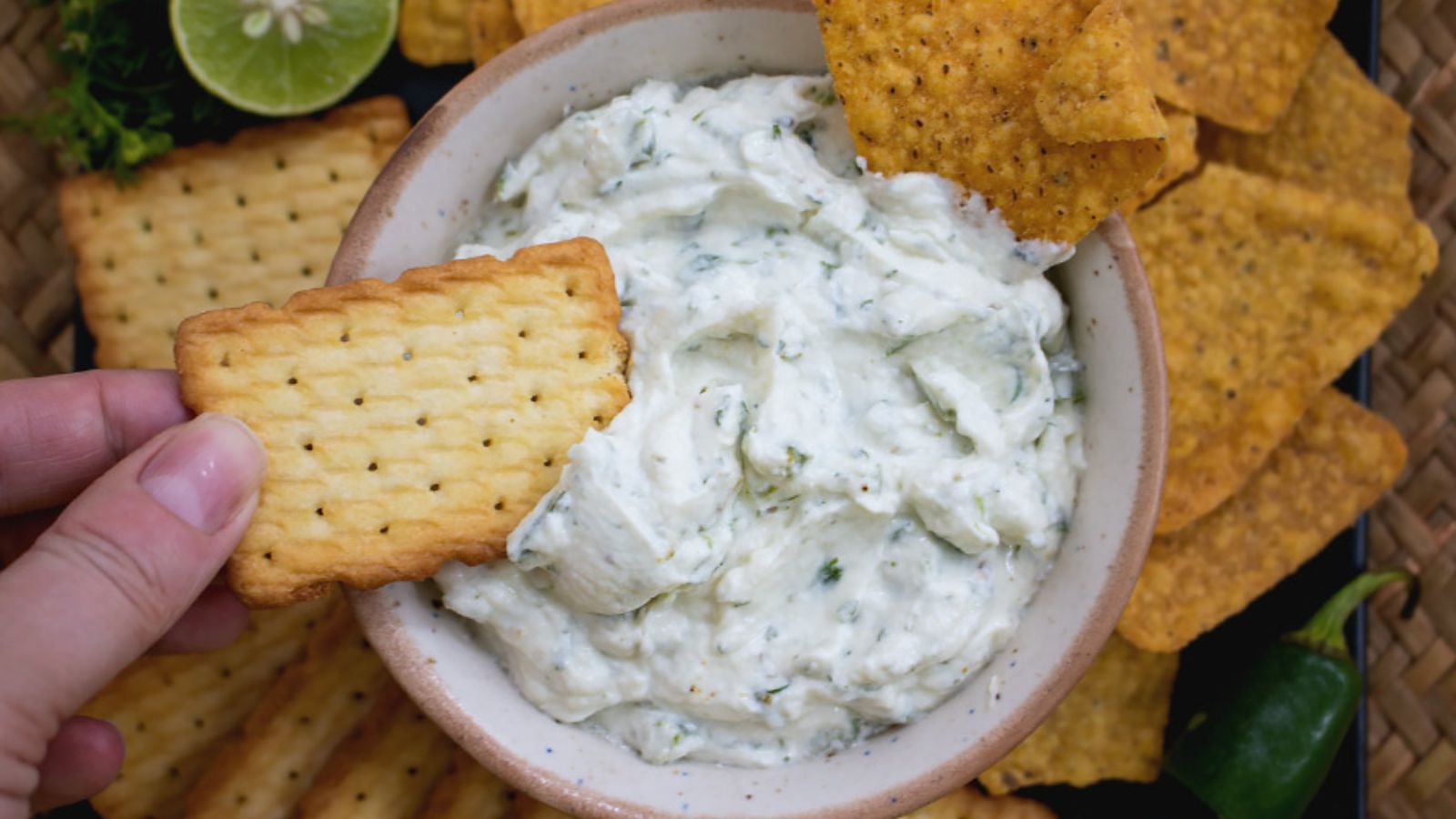 Biscuits dipping in cream cheese jalapeno.