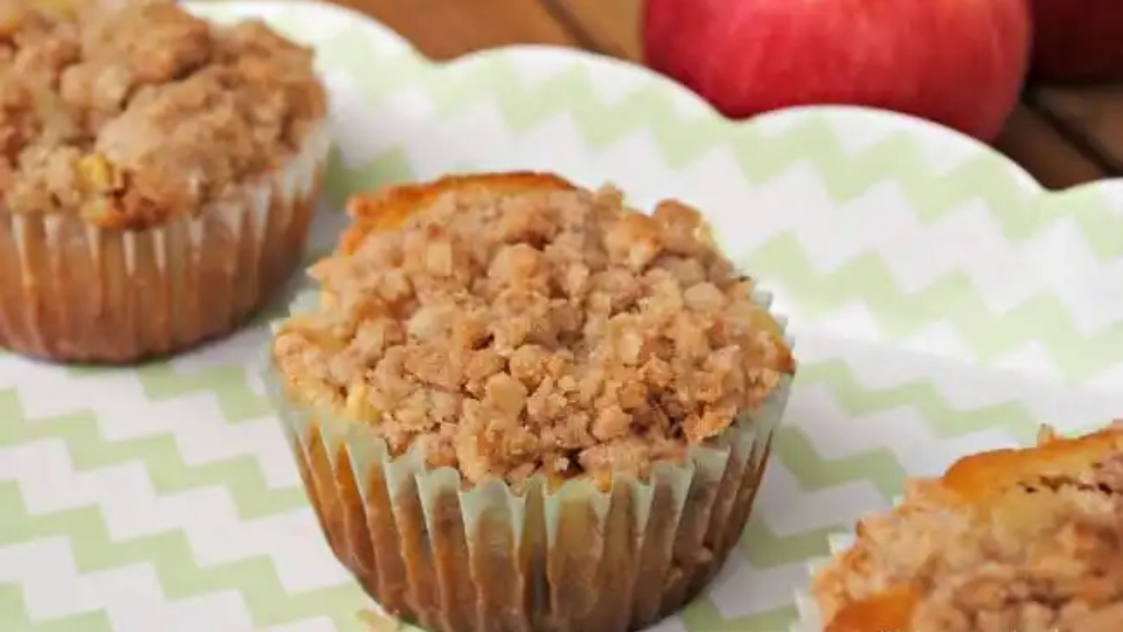 Apple cinnamon muffin on a plate.