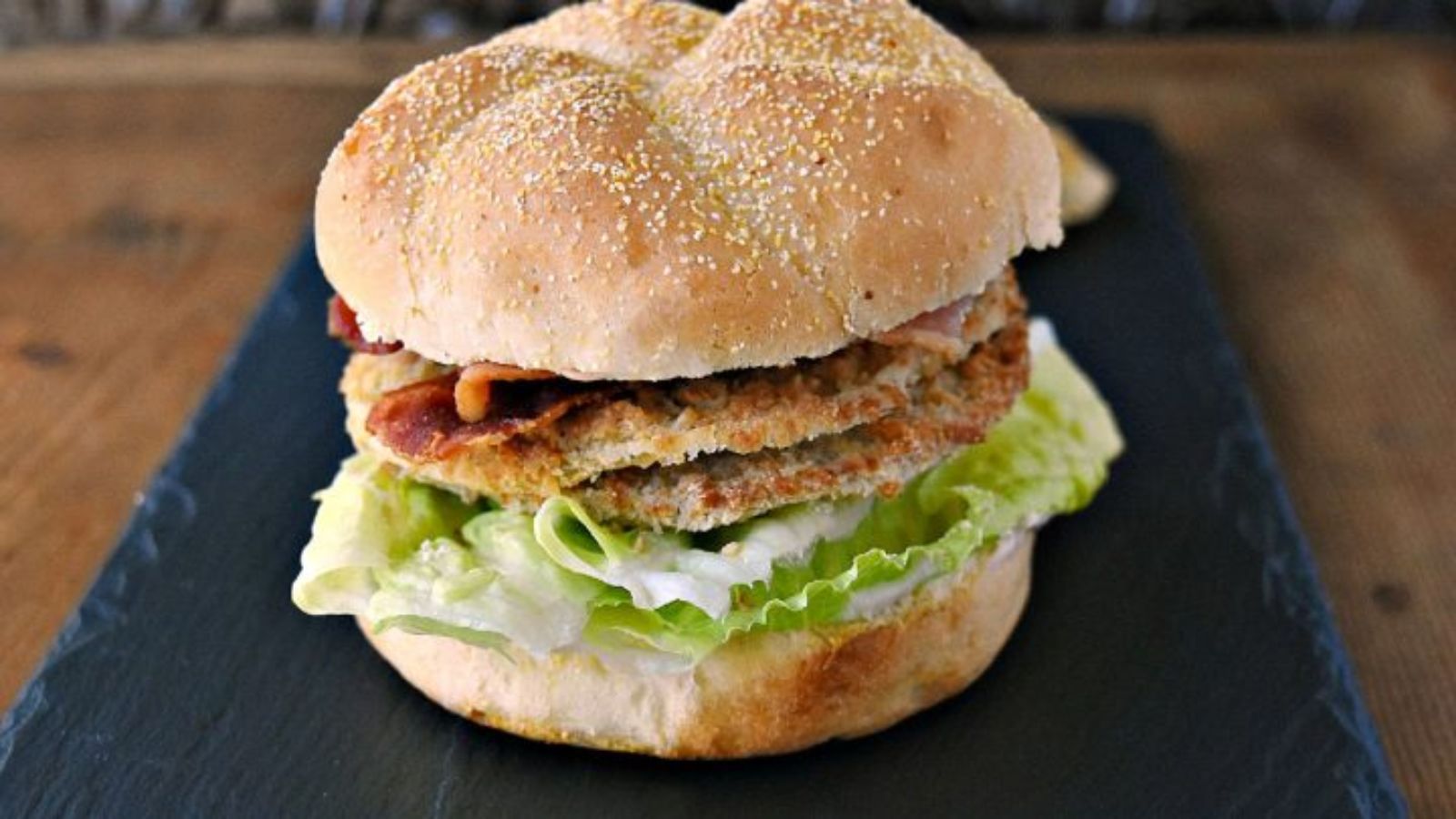 Burger with vegetables and meat.