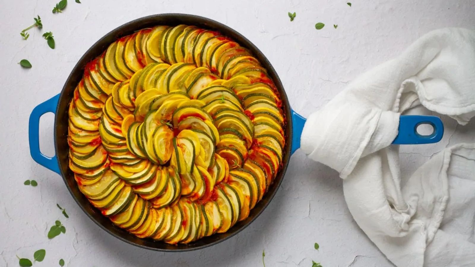 Zucchini and squash in a pan.