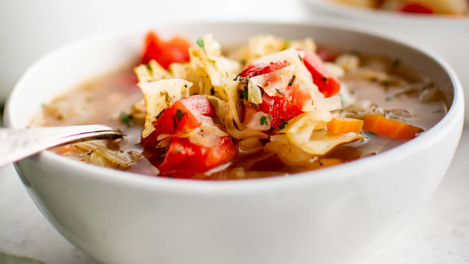 Cabbage soup in a bowl. 