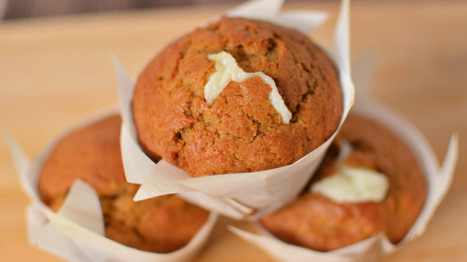 Carrot cake muffins with cream cheese filling.