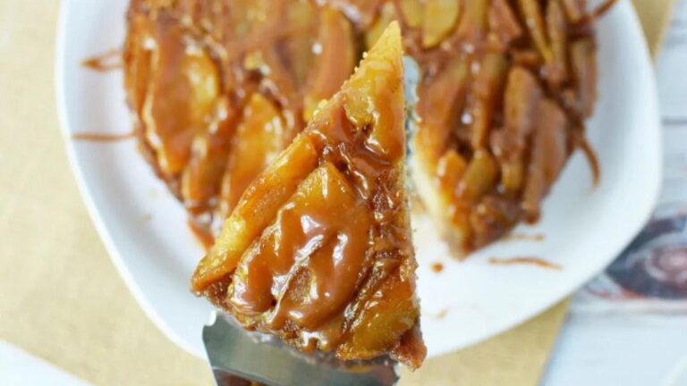 Slice of apple cake on a cake server.