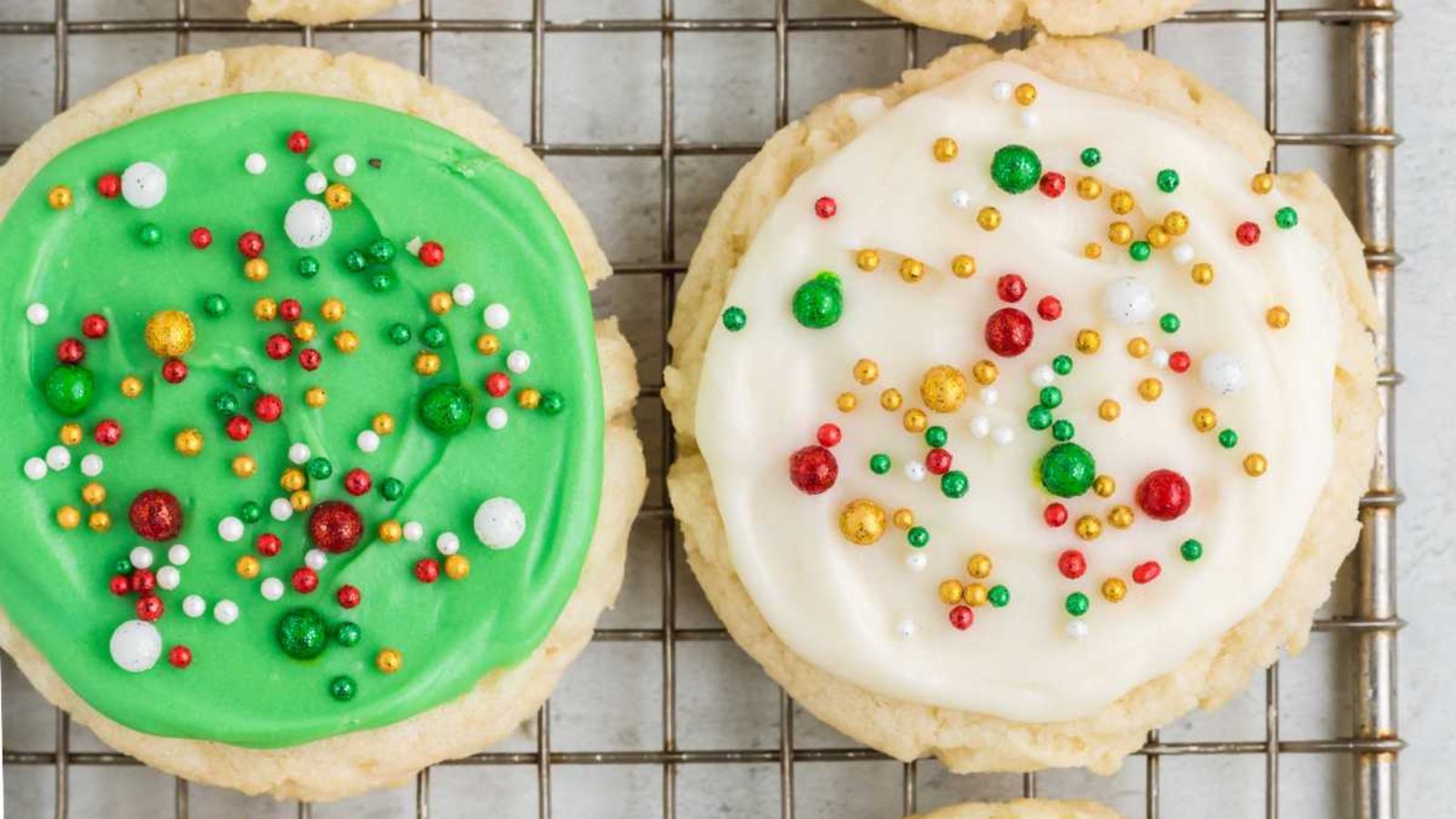 Sugar cookies with sprinkles on top.