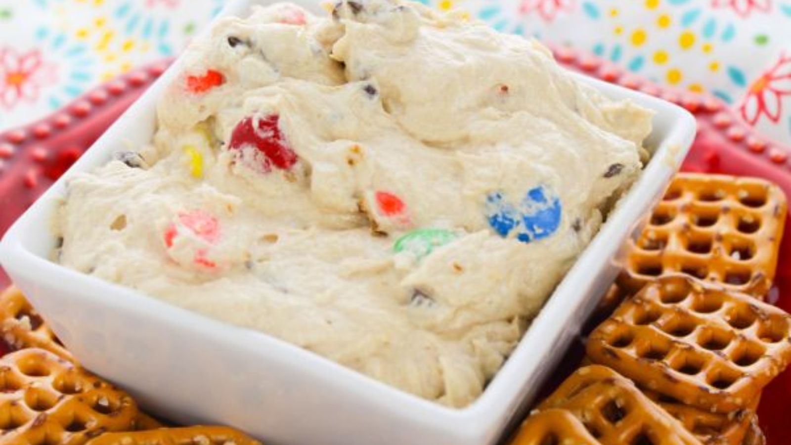Cream cheese with cookie dough in a bowl.