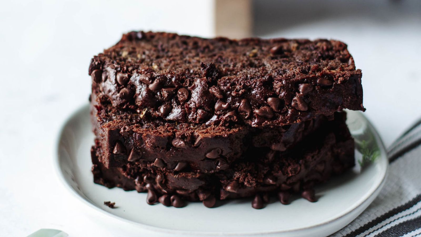 Chocolate zucchini bread on a plate.