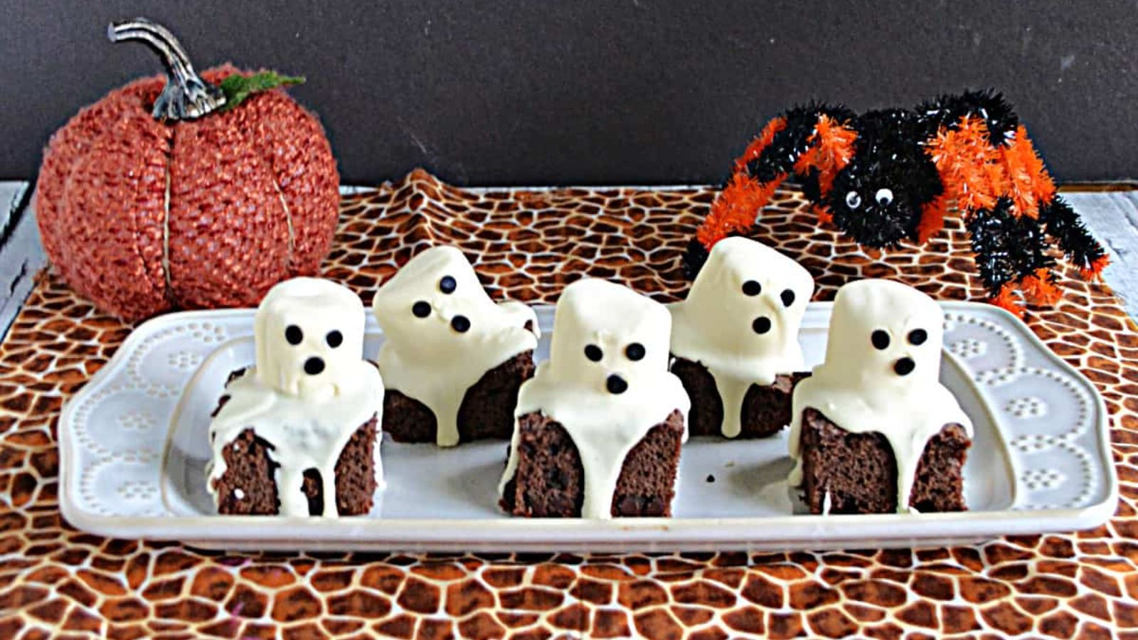 Ghost brownies on a plate.