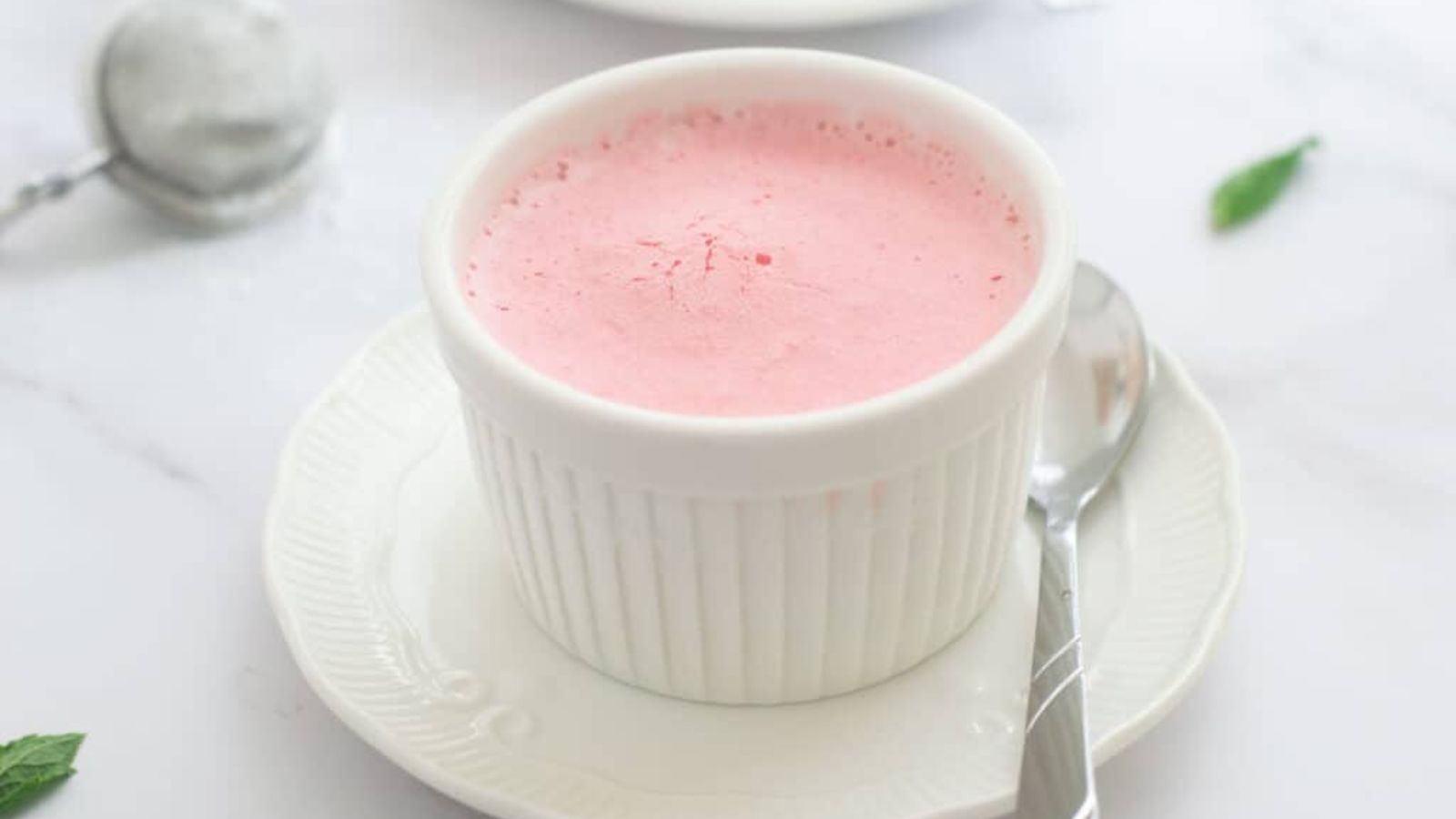 Frozen strawberry mousse in a cup.