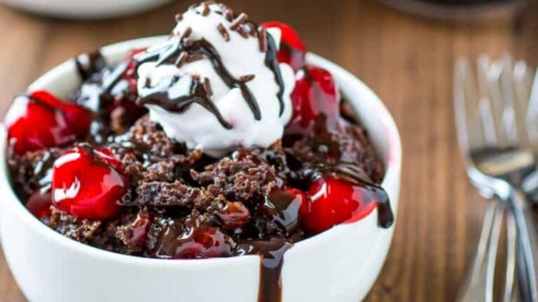 Chocolate cake with cherries.