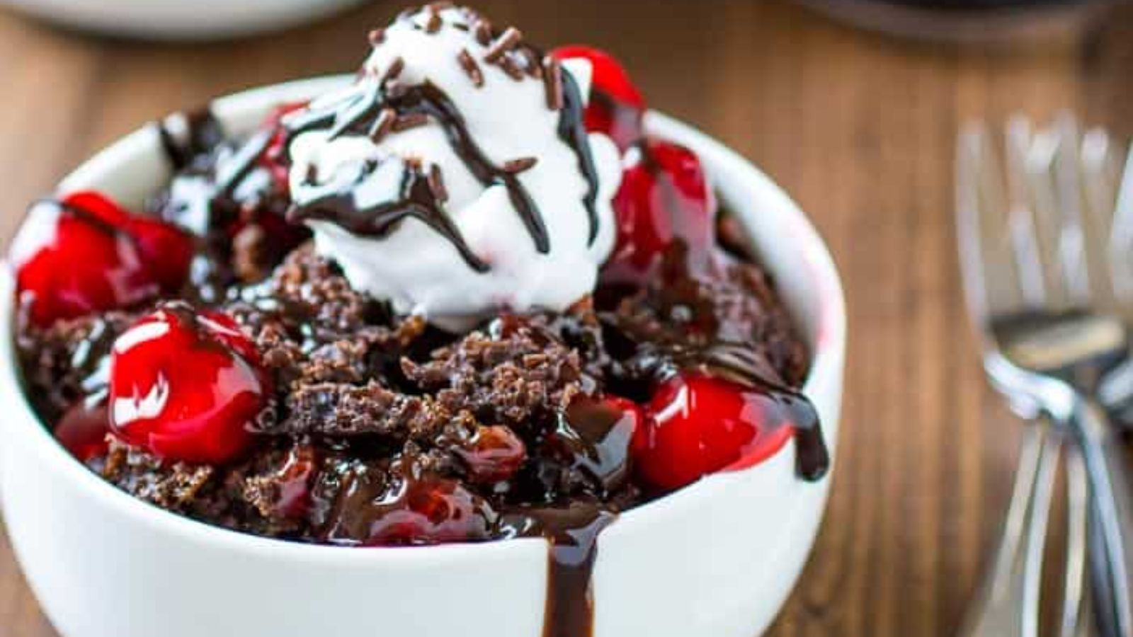 Chocolate cake with cherries.