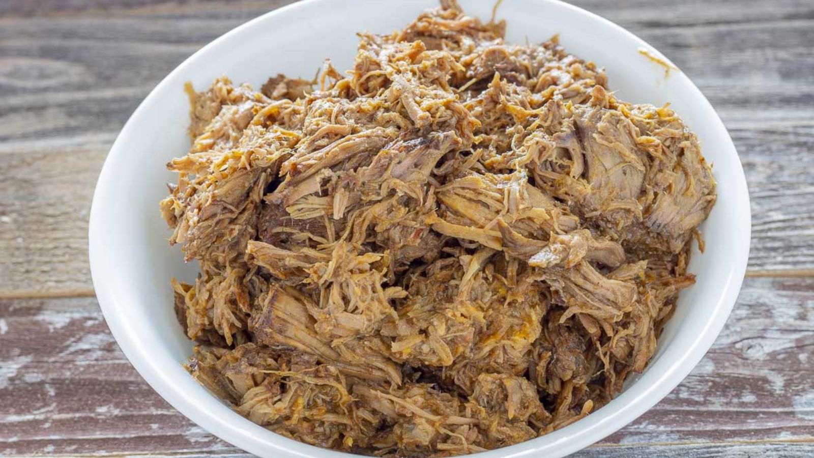 Barbacoa beef in a bowl.
