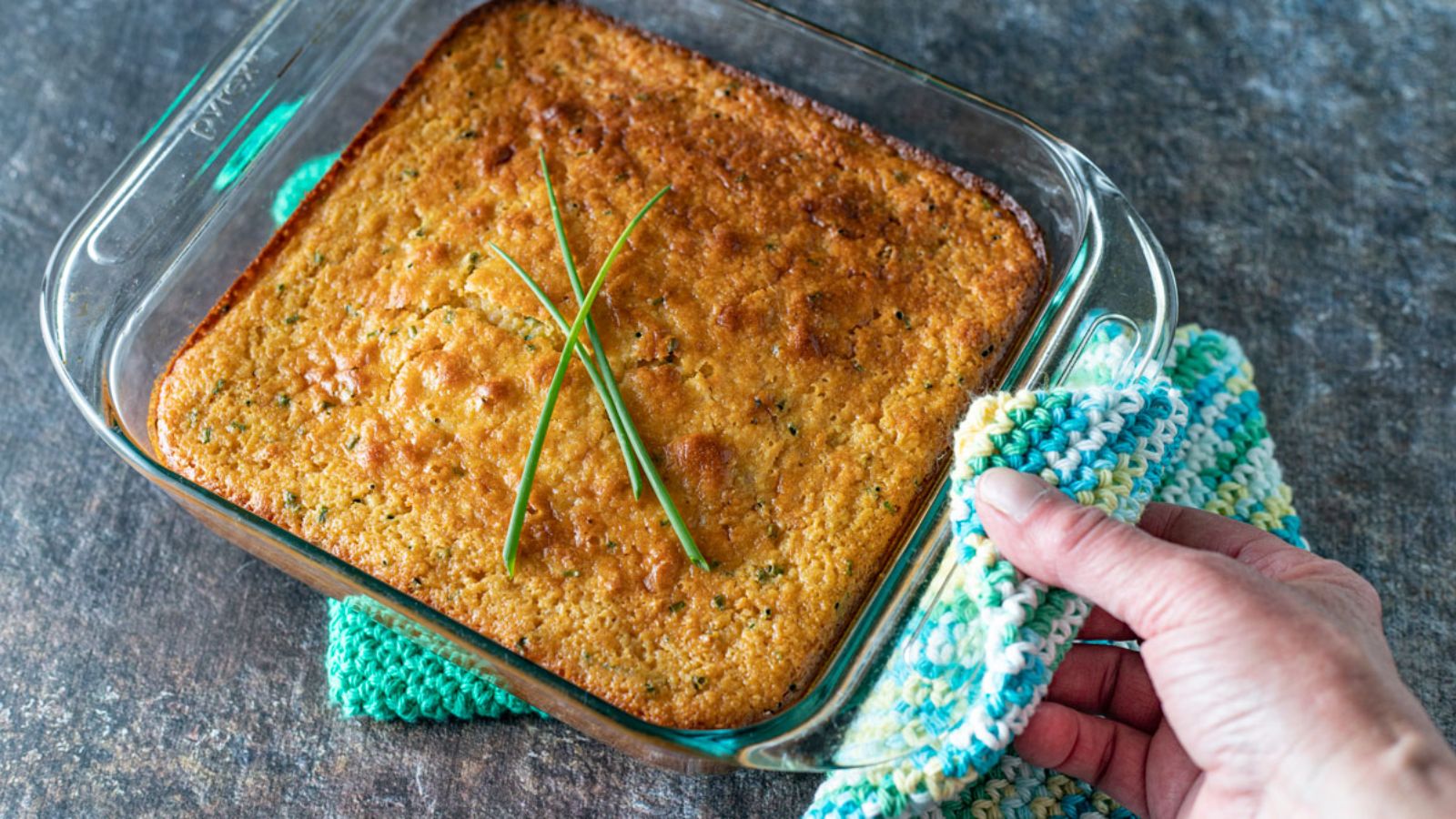 Jiffy cornbread in a glass tray.