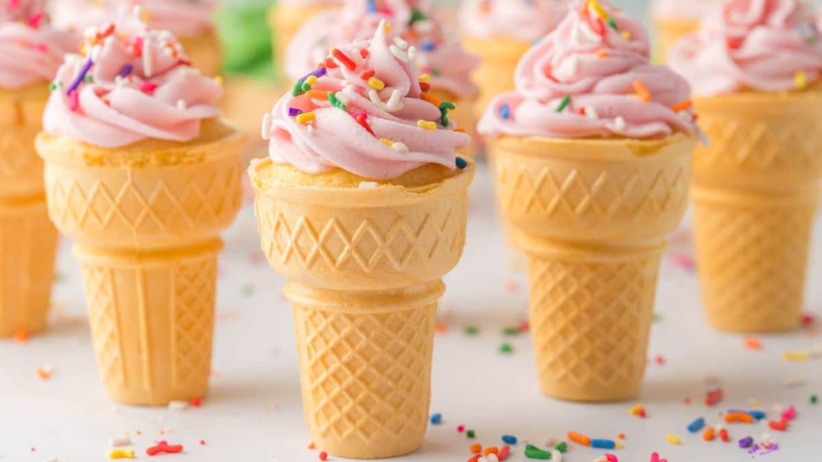 Ice cream cone cupcakes with sprinkles.