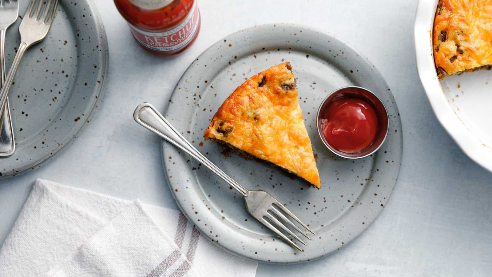 A slice of cheeseburger pie.