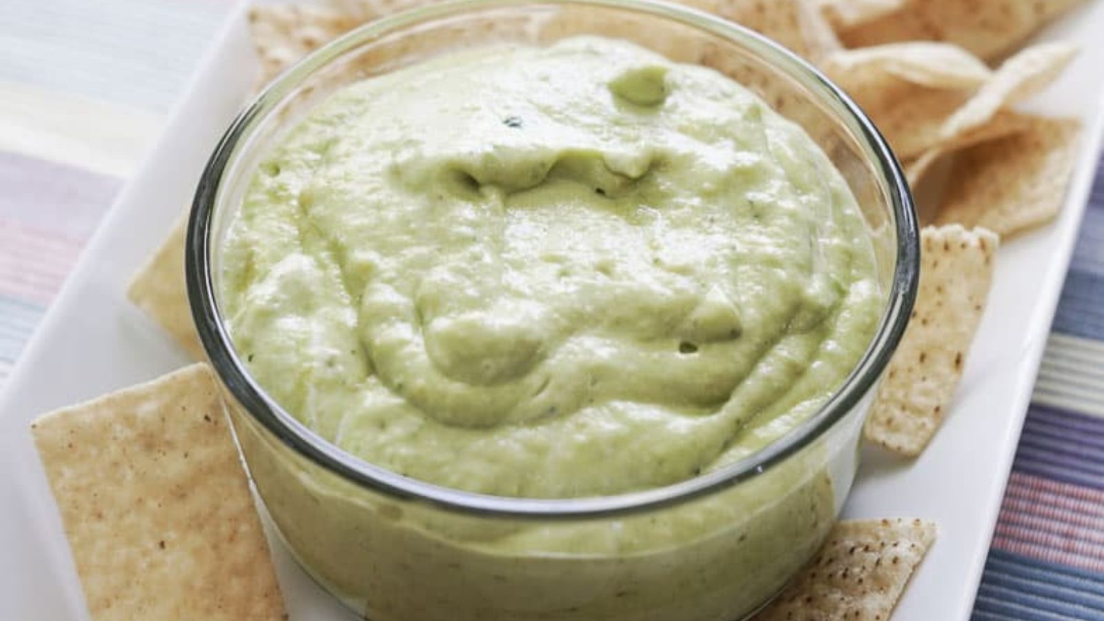Green sauce in a glass bowl.