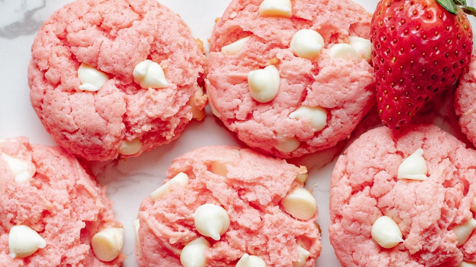 Strawberry cheesecake cookies with white chocolate chips.