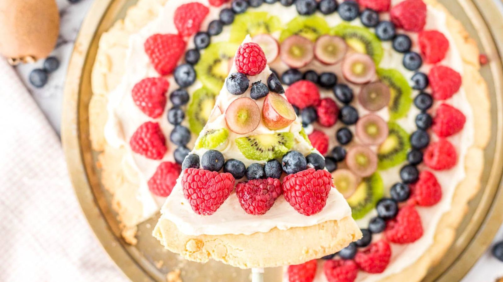 Sugar Cookie Fruit Pizza With Cream Cheese Frosting.