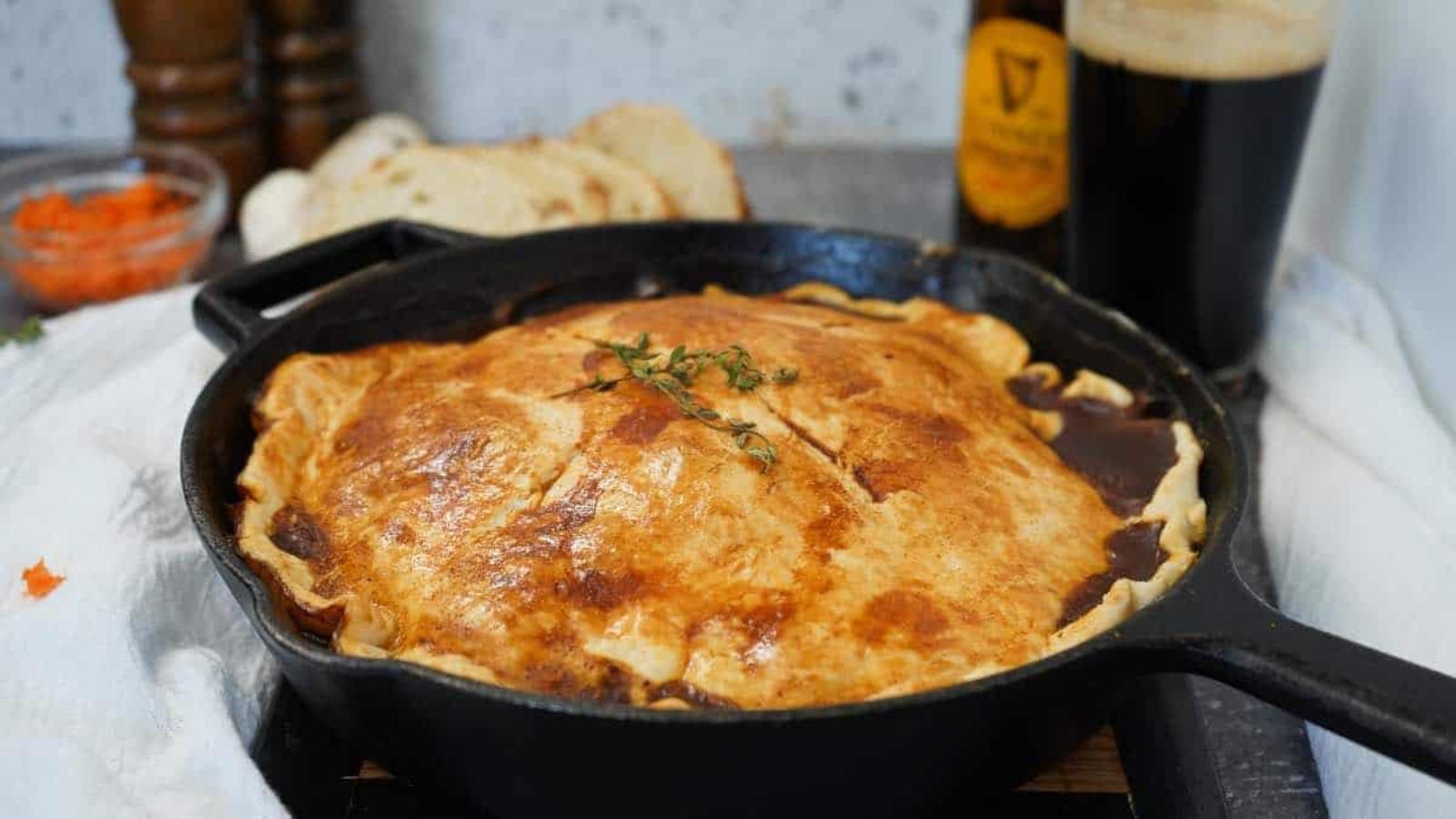 Beef stout pot pie in a pan.