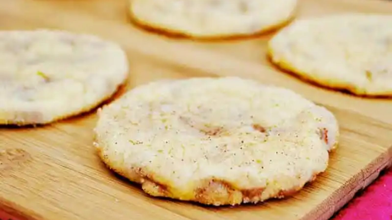 Snickerdoodle cookies on a wooden board.