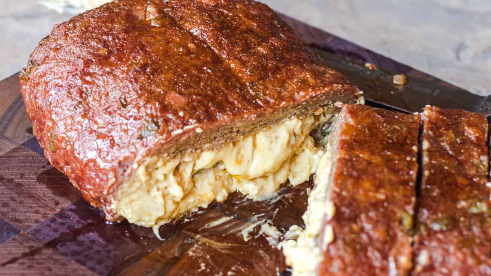 Meatloaf with cheese sliced in to half.
