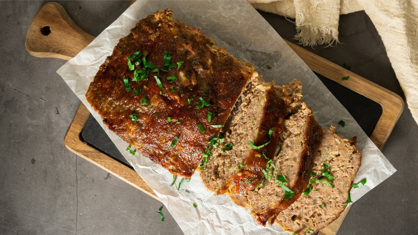 Meatloaf slices on a plate.