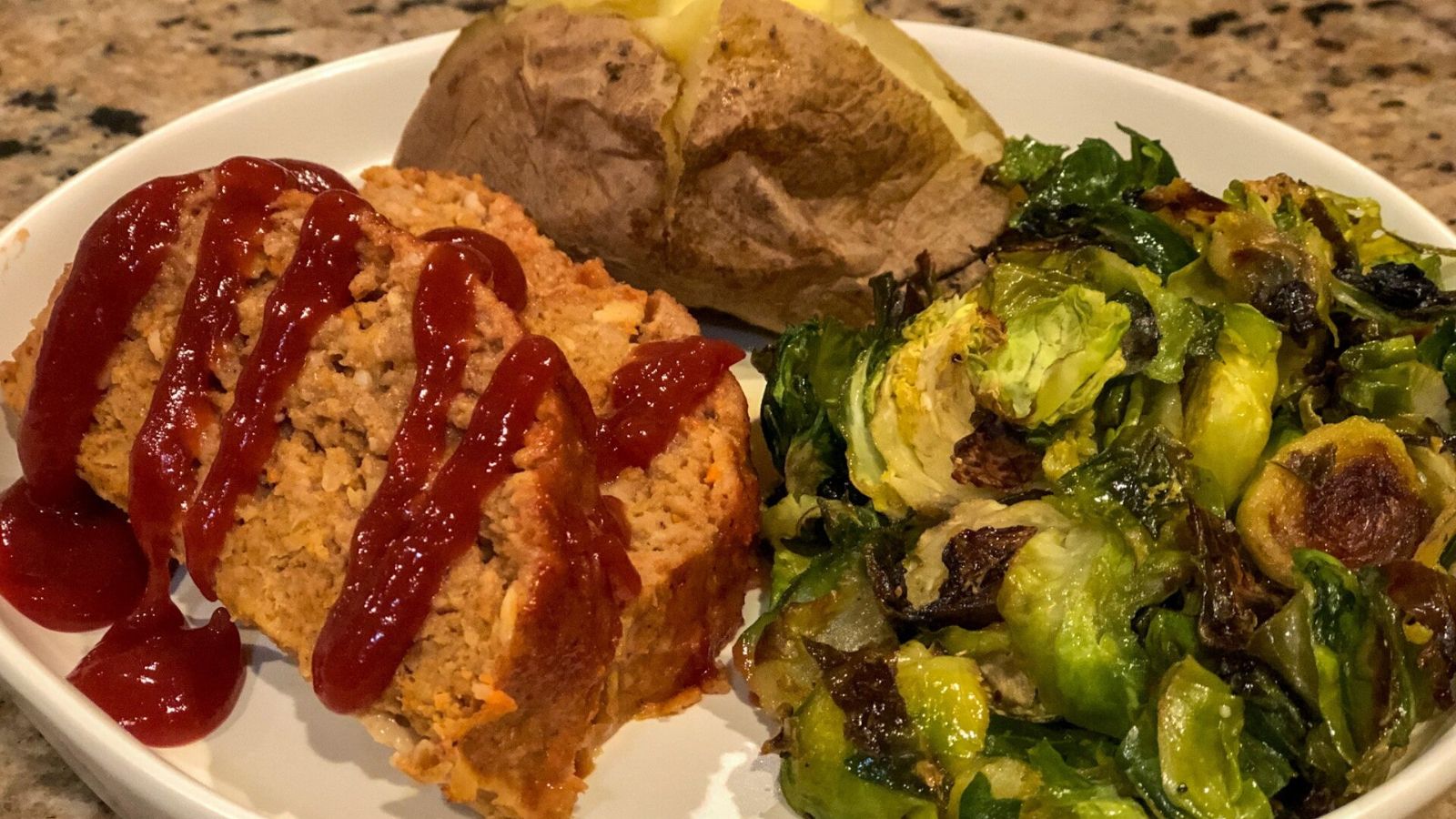Turkey meatloaf with broccoli on the side.