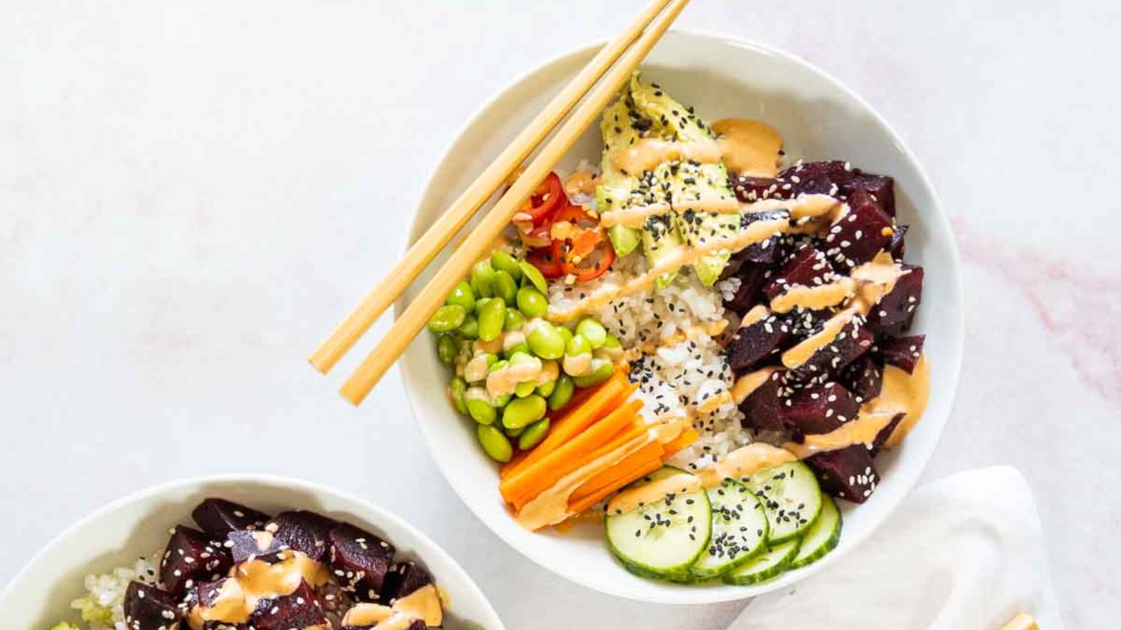 Poke bowl with beets in a bowl.