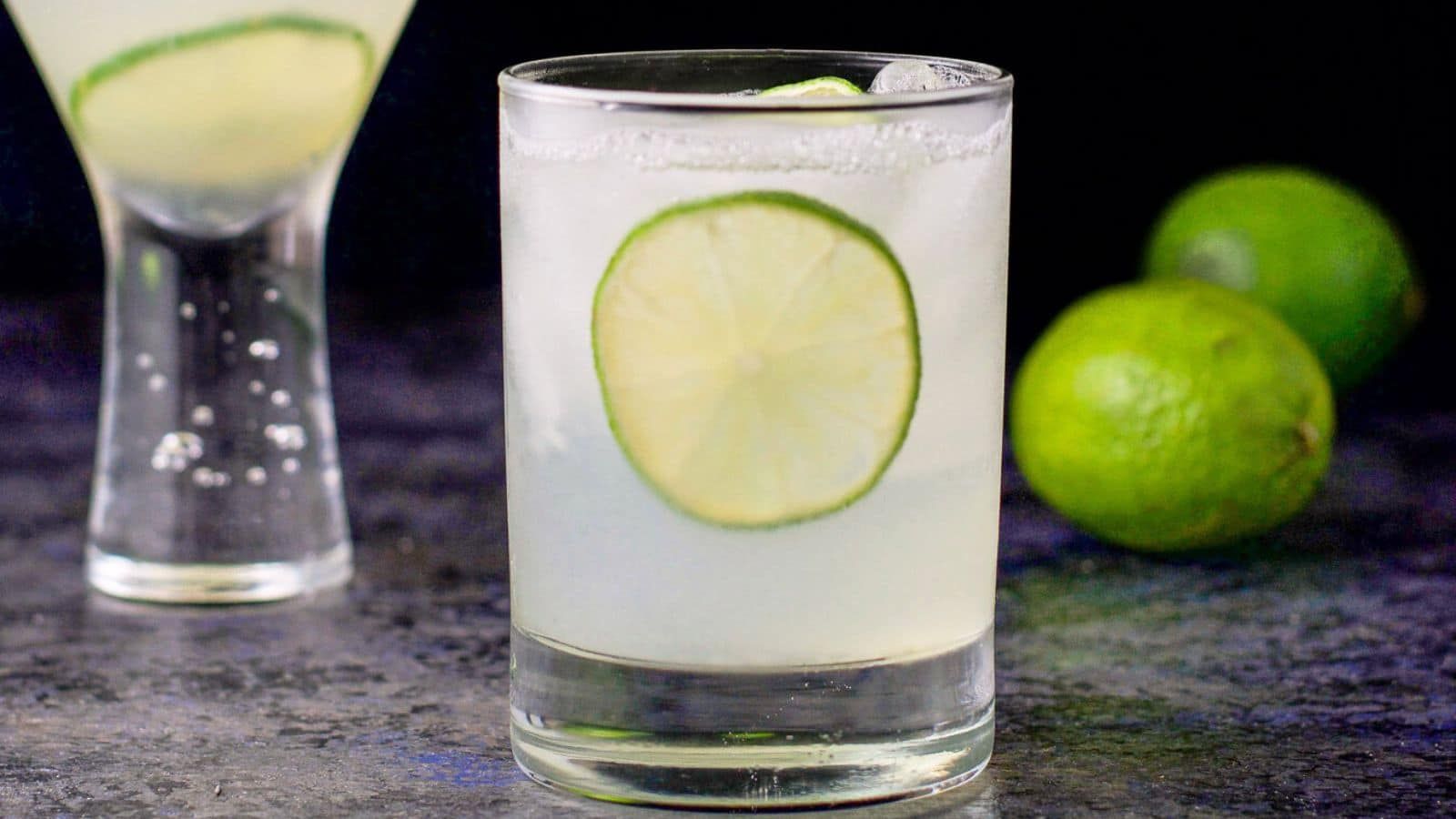 Vodka gimlet with sliced lime.