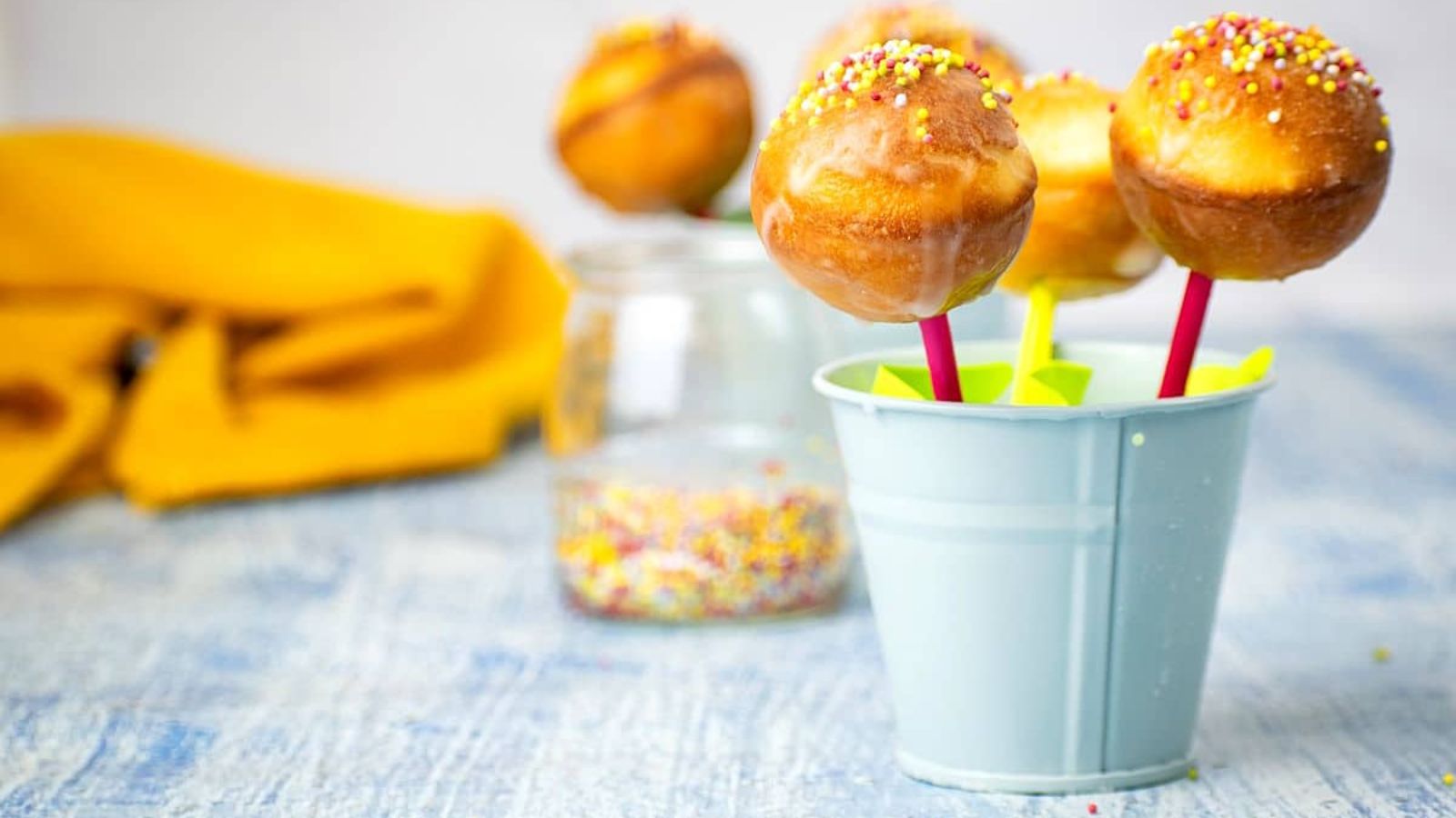 Cake pops in a glass.