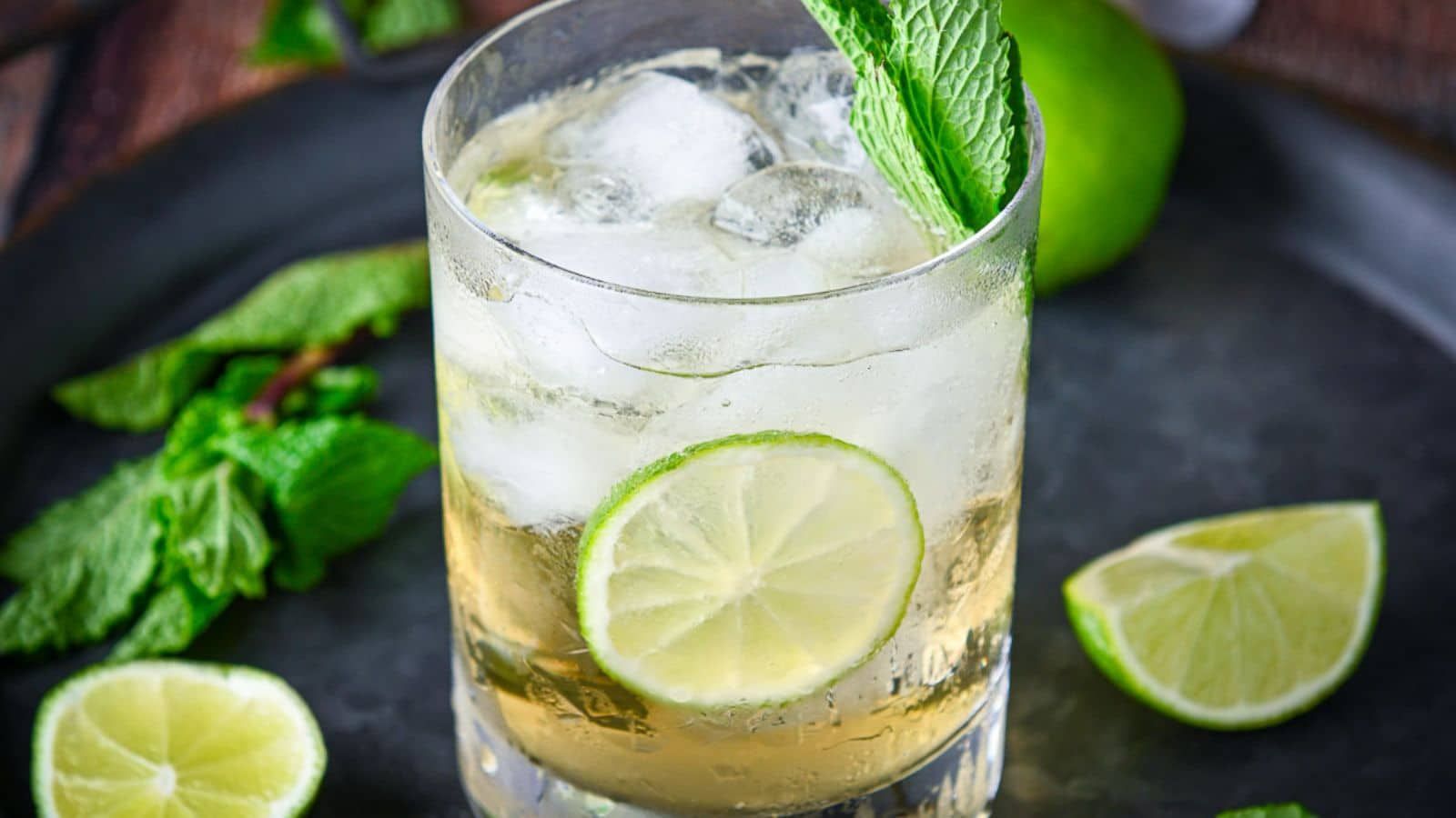 Hugo spritz with sliced lime.