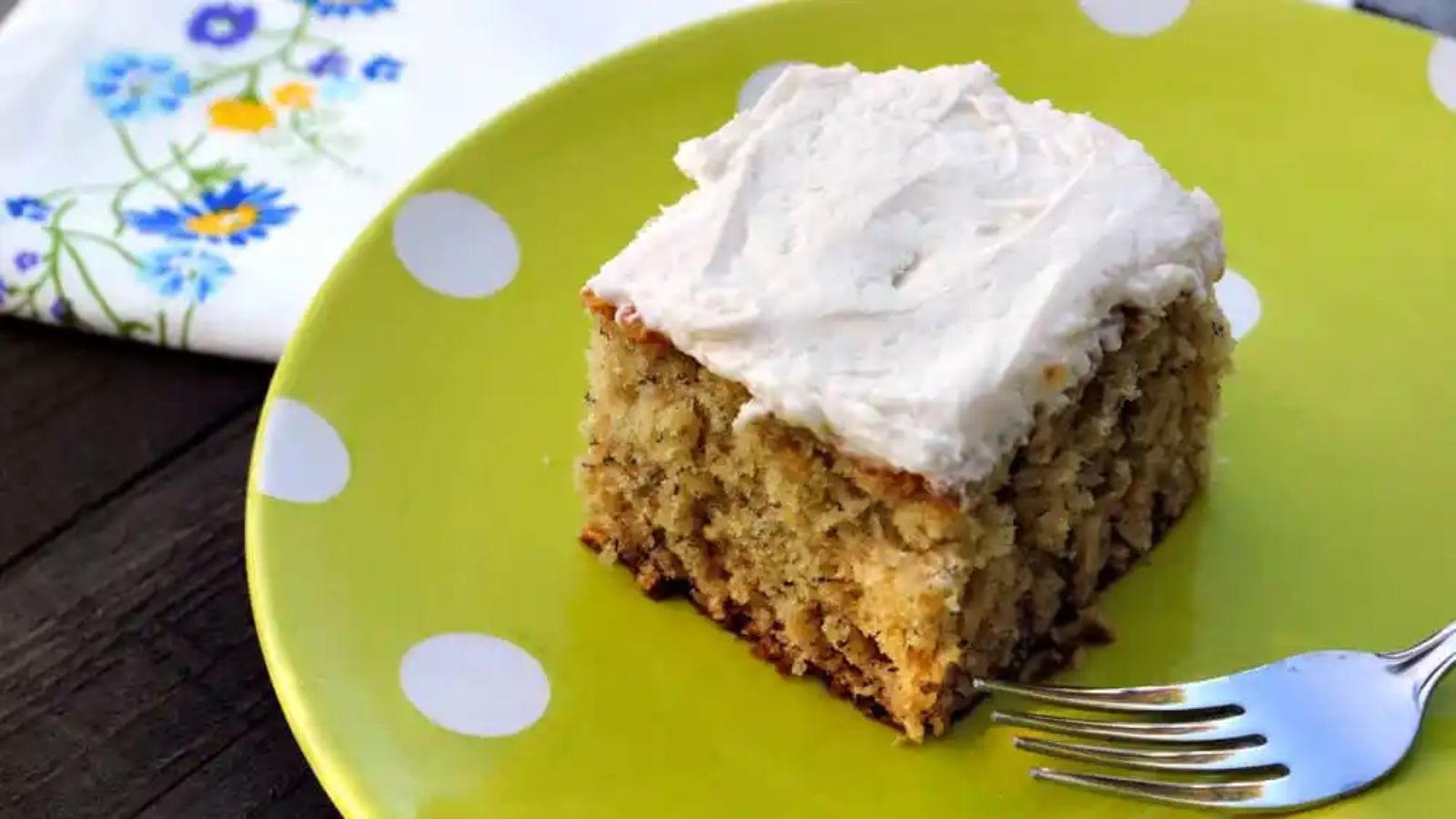 A slice of banana cake on a plate.